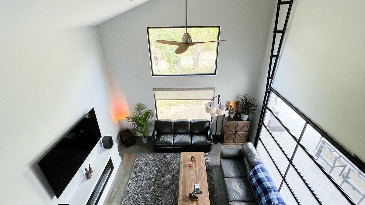 Stevensville House | Sleek forest retreat: karaoke, spa, campfire, pool table, grill, outdoor games