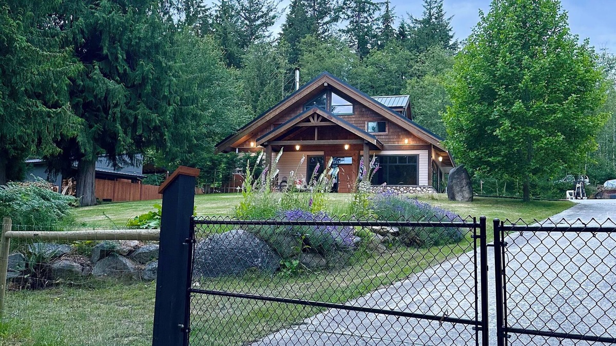 Mansons Landing Ski Chalet | "Sleeps 15: Dog-Friendly Rustic Haven on Cortes Island" Large grass yard