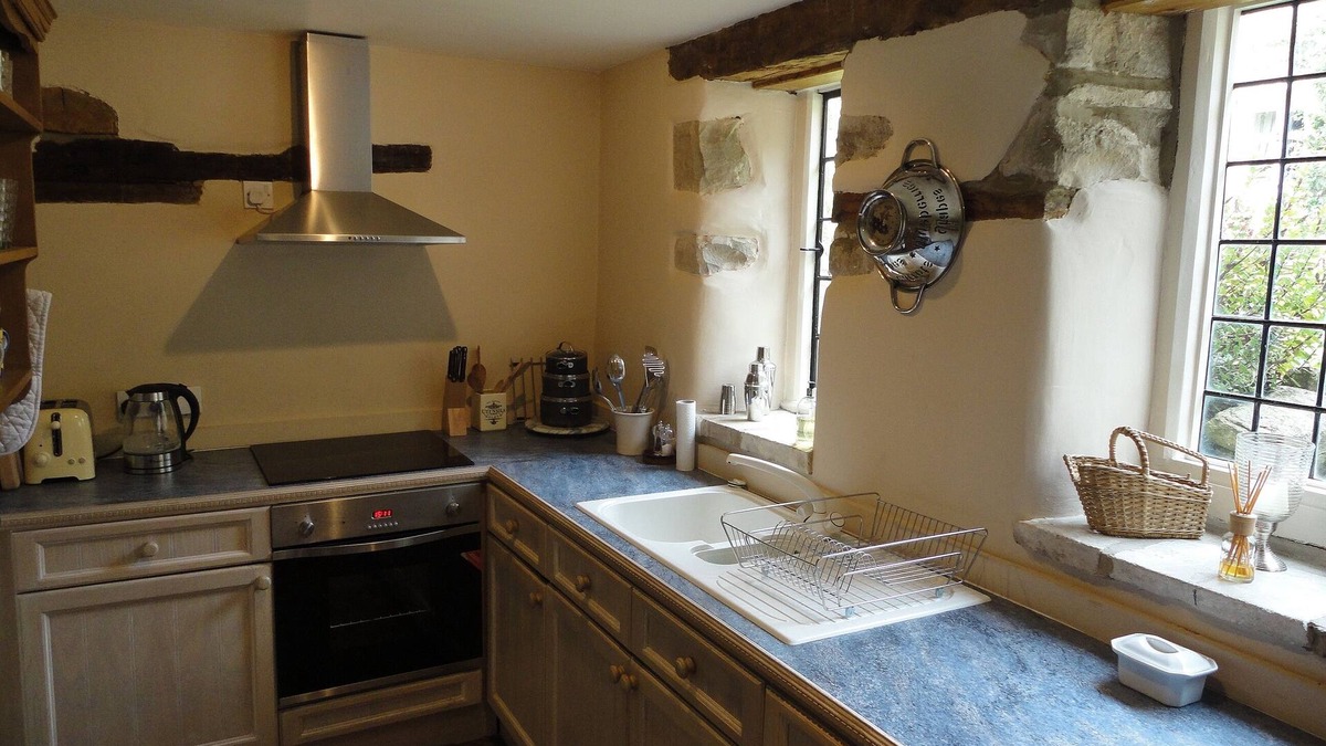 Duntisbourne Abbots House | Small converted barn in peaceful village setting.