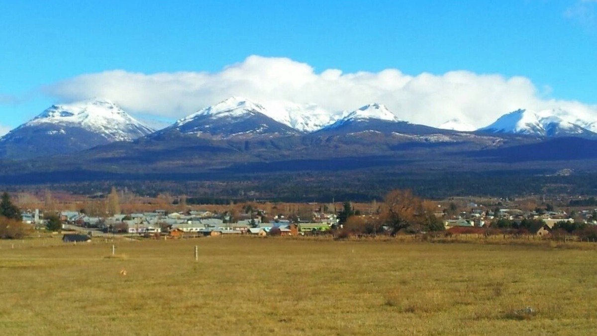 Trevelin House | "Small house on a raised hill, facing the imposing Andes mountain range."