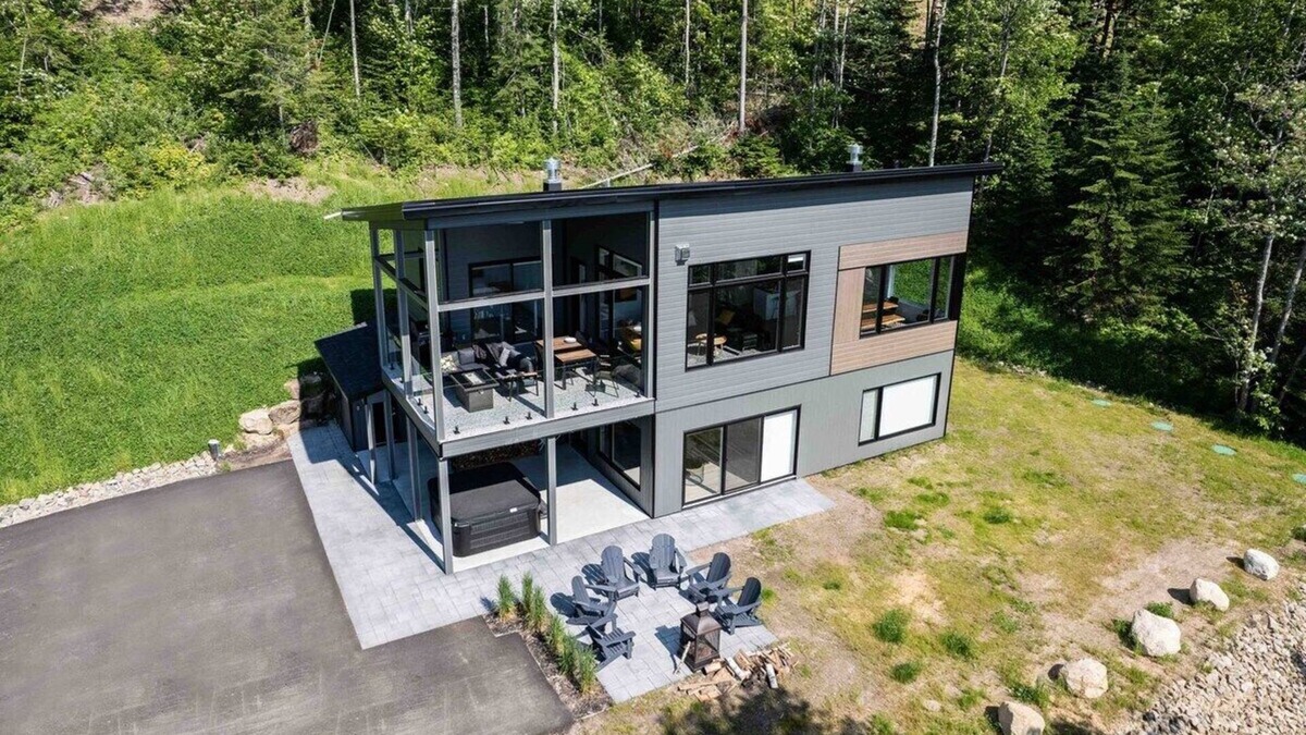 Les Eboulements Ski Chalet | Solstice 203: Luxury Living, Riverfront Serenity