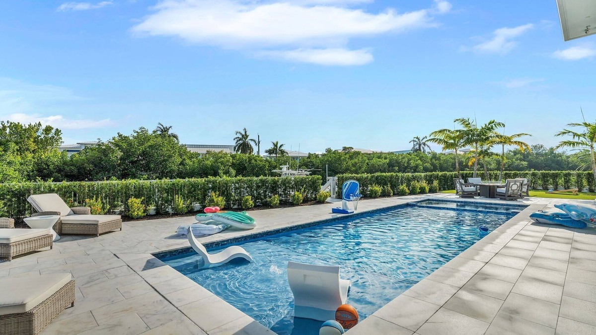 Coury House | Sophisticated 5-bedroom, elevator, 50' dock, heated pool/spa, sleep 12