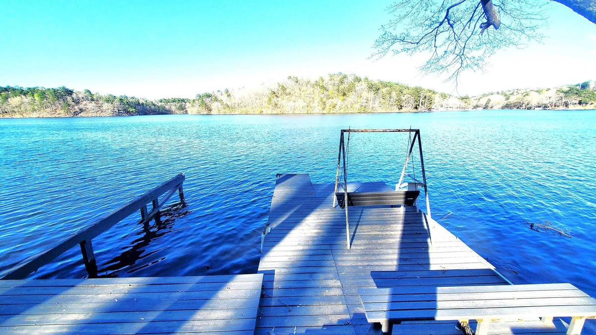 Jones Mills House | Spacious 4-bed, 3-bath home located on Lake Catherine with pool and boat dock