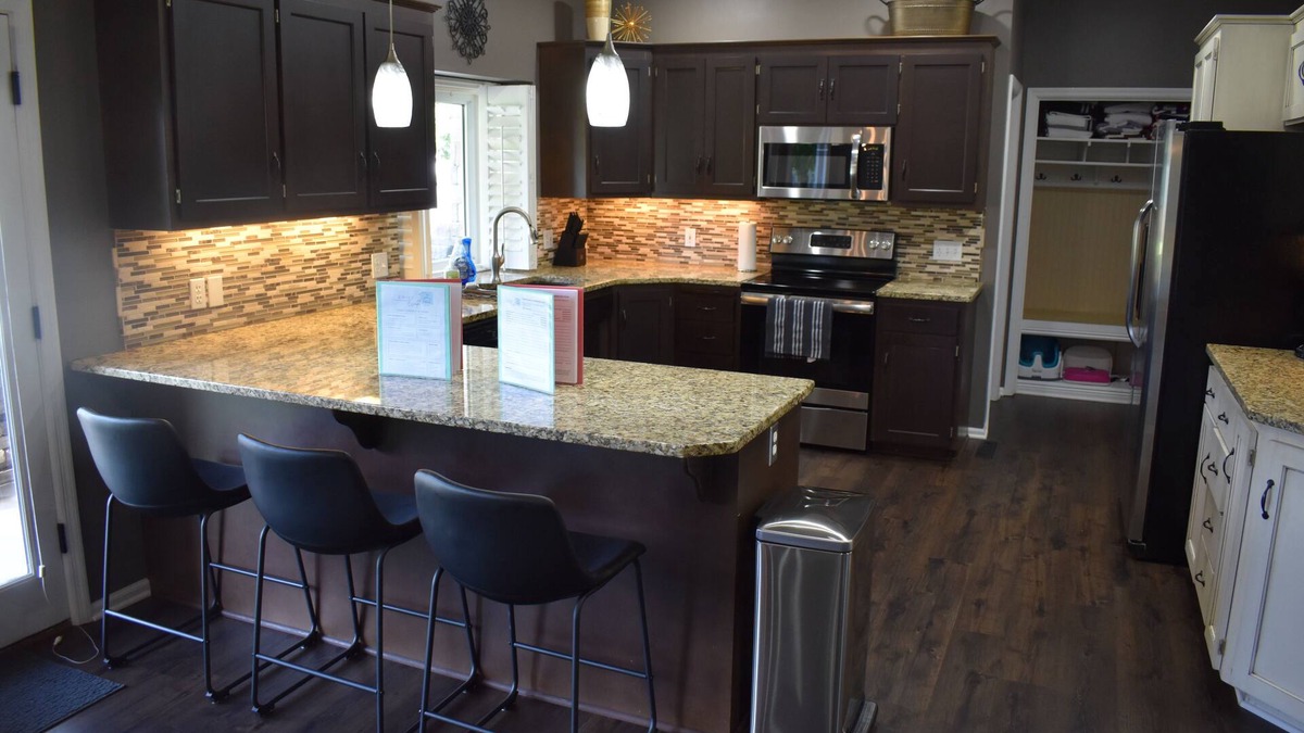 Omaha House | Spacious 5-bed 4-bath retreat. Backyard oasis with pool, hot tub, and fireplace.