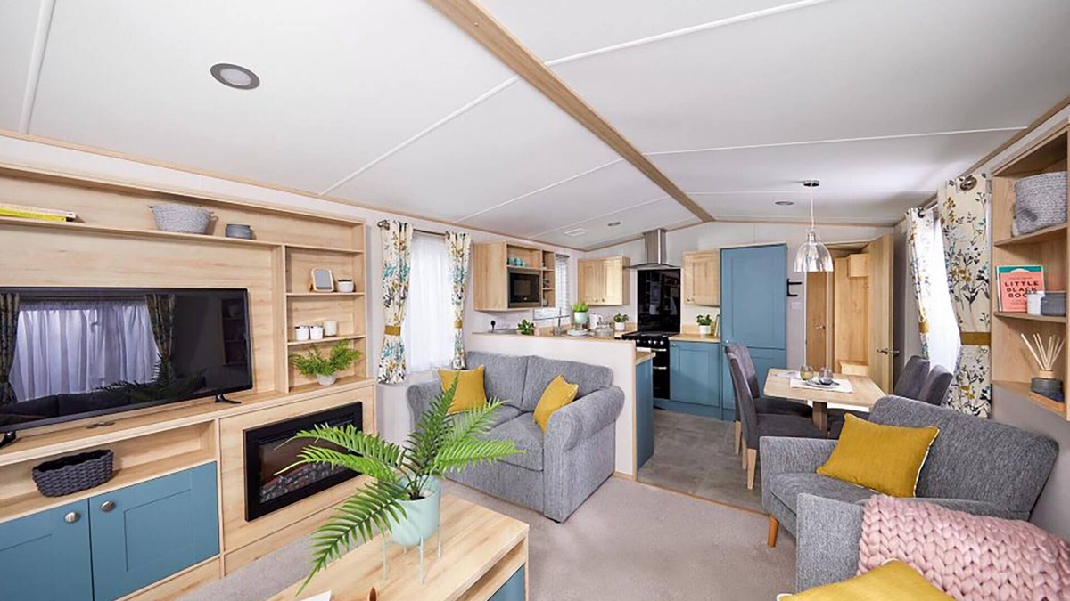 Llanllwchaiarn House | Spacious and modern 12ft-wide caravan with one double and two twin.