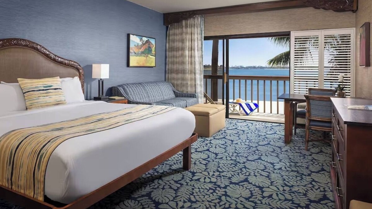 Crown Point Hotel | Spacious Bayfront King Suite | Relax at Catamaran Resort
