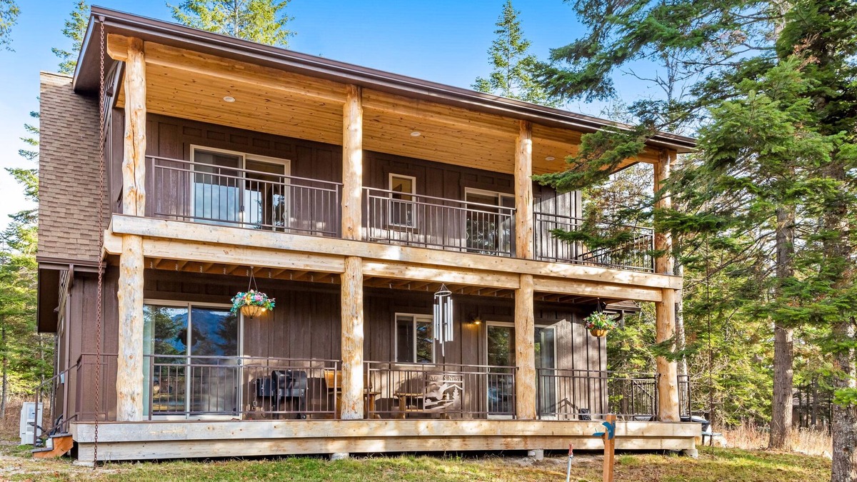 Bigfork Cabin | Spacious cabin overlooking Swan Lake with 2-story deck, fireplace & firepit