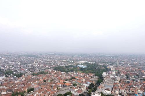 Cibaduyut Apartment | Spacious Combined Studio at Mekarwangi Square Cibaduyut Apartment By Travelio