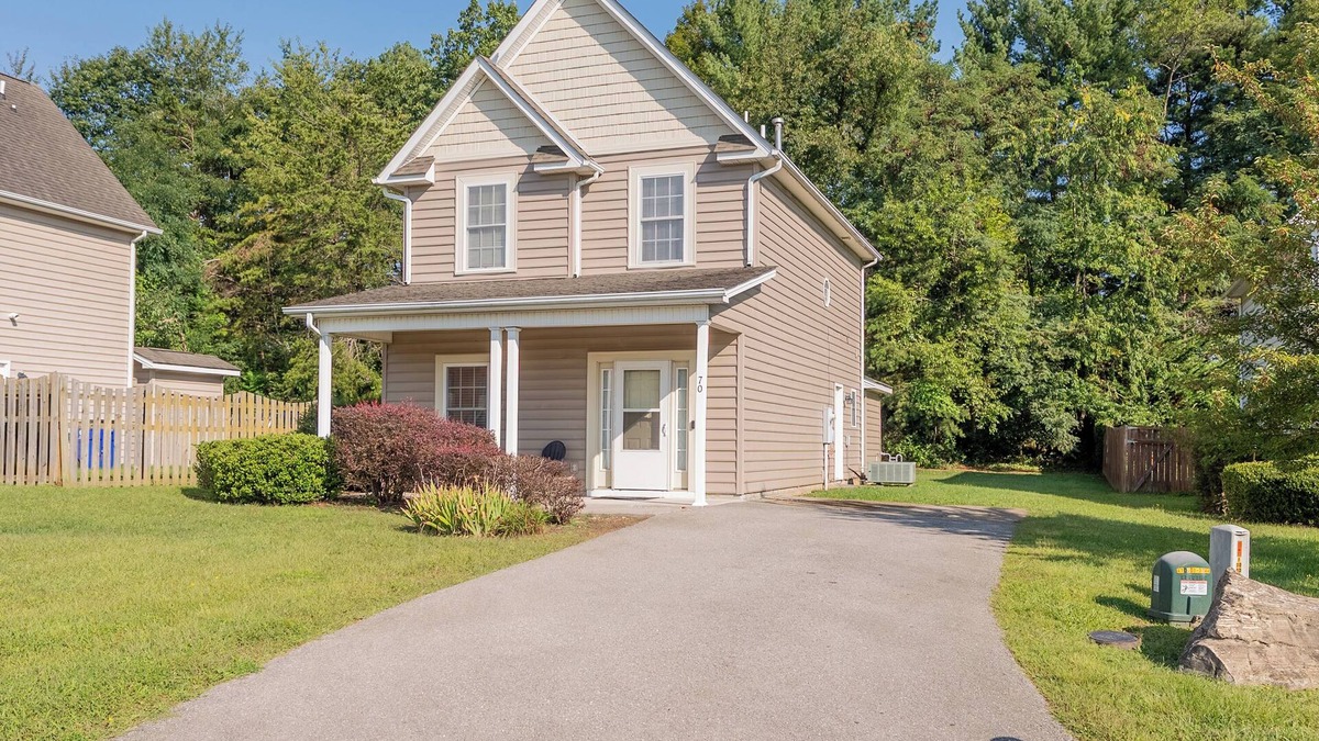 Christiansburg House | Spacious family home with multiple bedrooms, full kitchen, porch, and quaint backyard.