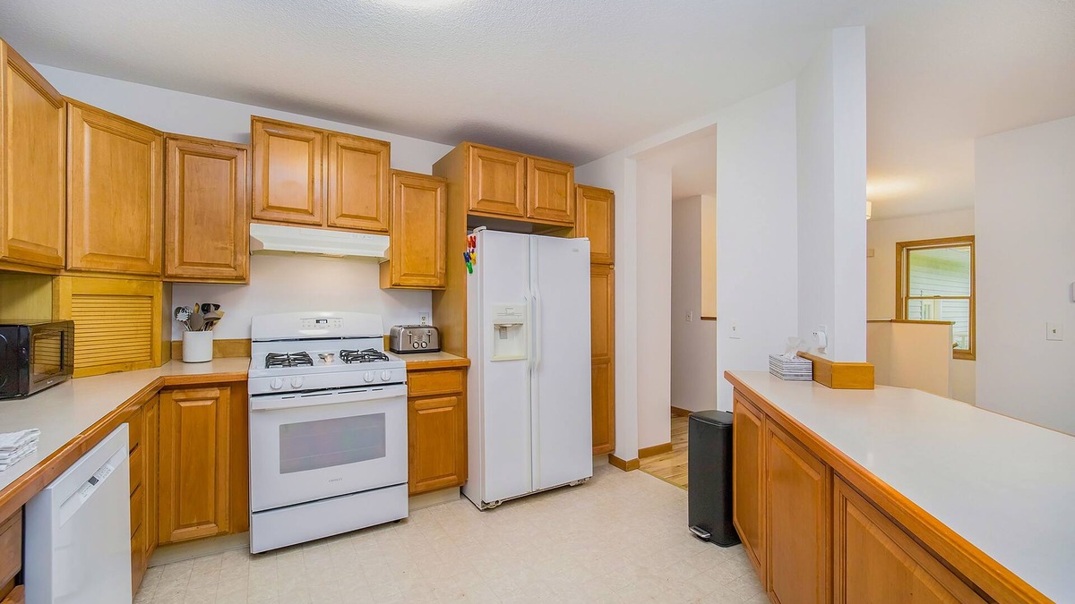 Bay Harbor House | Spacious home with fireplace, full kitchen, central AC, & washer/dryer