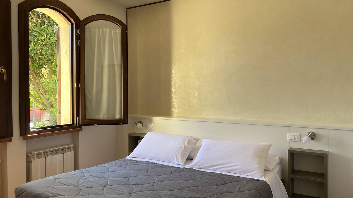 Colombare Apartment | Spacious JOLLY three-room apartment equipped with all comforts, with garden and terrace.