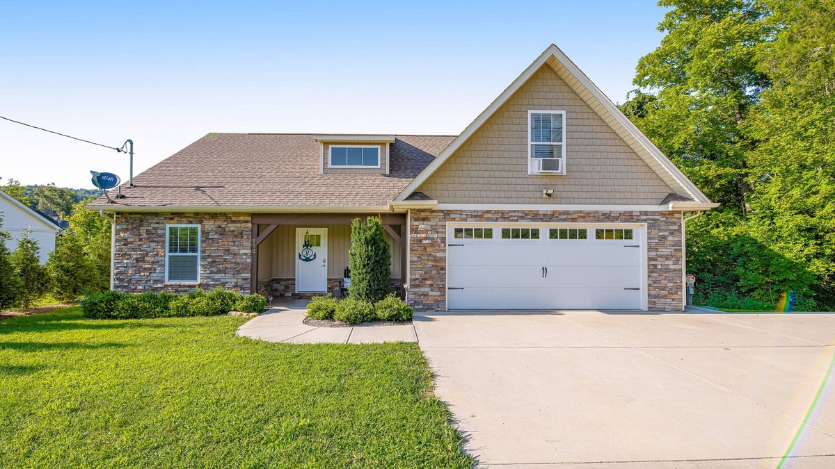 Maynardville House | Spacious, lakefront home with private dock, hot tub, chic decor, & amazing views