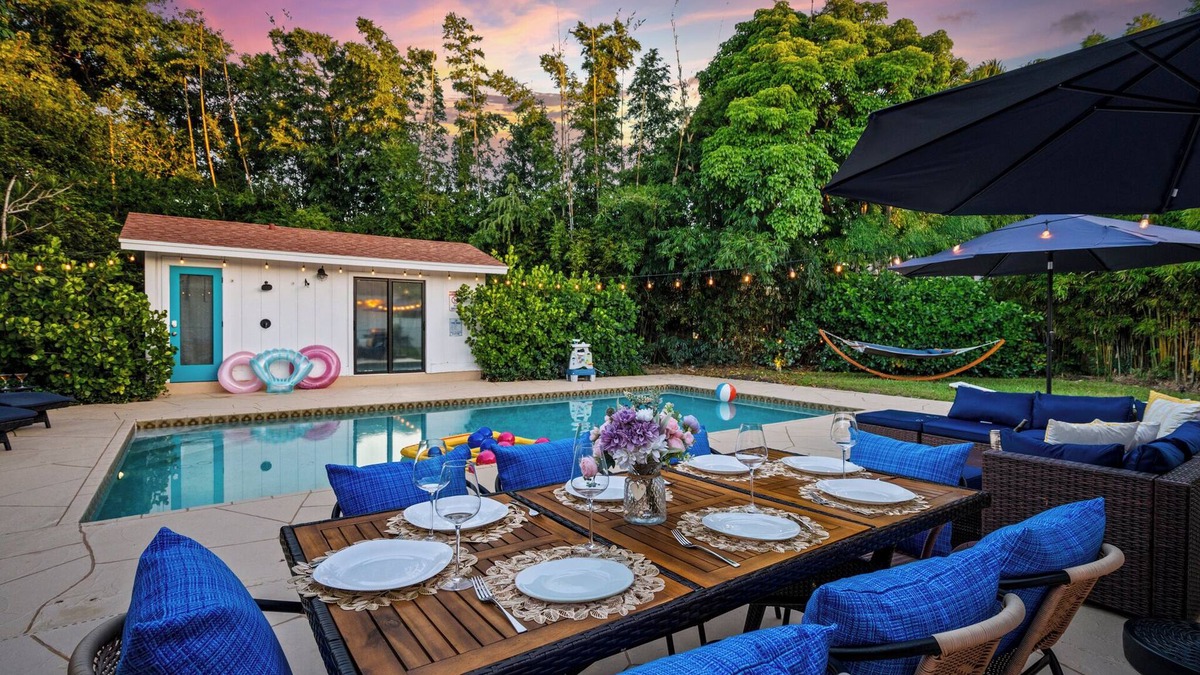 Lake Clarke Shores House | Spacious Palm Beach Paradise with Heated Pool and Backyard Games