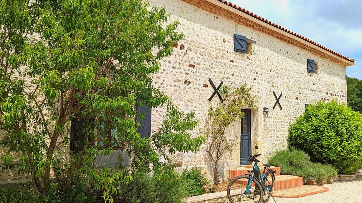 Montmoreau-Saint-Cybard Cottage | Spacious Stone House with Shared Pool, Babyfoot, and Nature Trails in Bucolic Setting