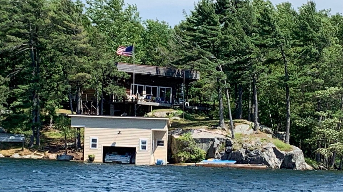 Hammond House | St. Lawrence River Cottage with 107 ft of river frontage and a boathouse