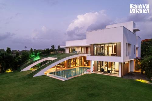 Kihim Villa | StayVista at Gardenéa with Outdoor Pool, Huge Lawn