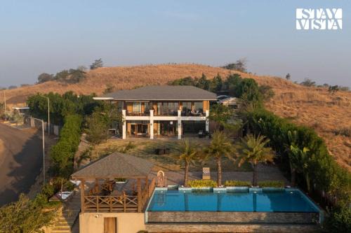 Paud Villa | StayVista at Ridgewood Mansion with BBQ, Gazebo & Infinity Pool