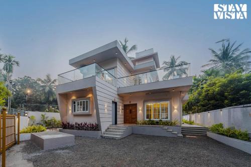 Nagaon Villa | StayVista at Serenity Shores with Pool, Bonfire, Lawn