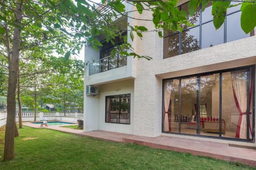 St.Stanislaus Villa Villa | StayVista's Greenwoods Villa 9 - City-Center Villa with Private Pool, Terrace, Lift & Ping-Pong Table