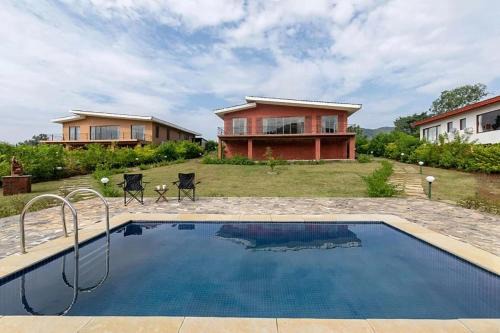 Kurvande Villa | StayVista's Shivom Villa 5 - A Serene Escape with Views of the Valley and Lake