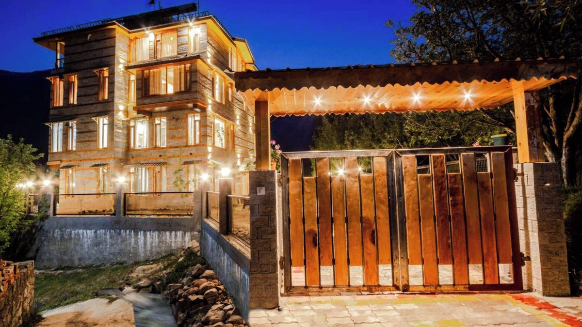 Manali Ski Chalet | Stone and wood cosy chalet admist apple garden with a beautiful law