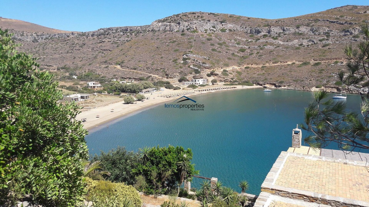 Kea Villa | Stone built waterfront villa with direct access to the sandy beach of Spathi,