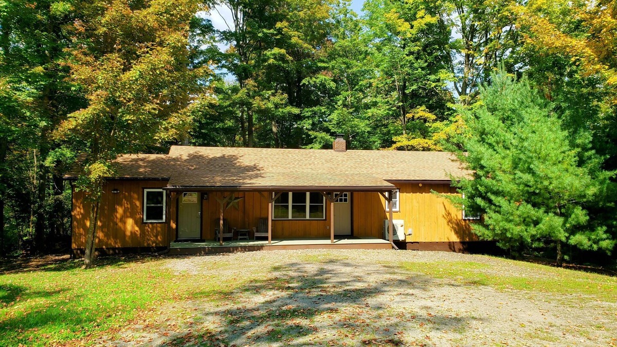 Sabinsville Cabin | Stone fireplace, Kingsize beds,3 baths,3 bdrms,2 creeks,10 acres,covered decks,