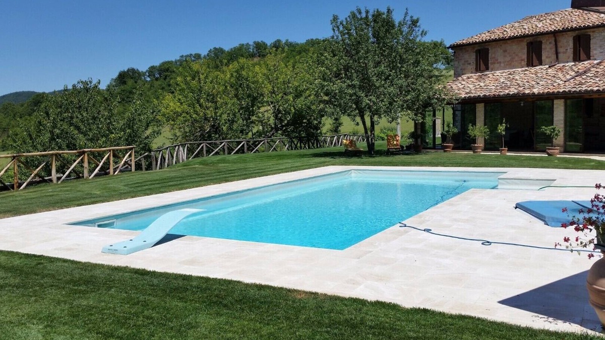 Genga Villa | Stone villa, with private pool, immersed in the greenery of Frasassi Park.