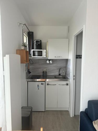Merville-Franceville-Plage Apartment | Studio 100 m from the beach!