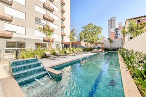 Partenon Apartment | StudioLUX, Vaga Grátis, Piscina, Gym, NetFlix, ao lado da PUC