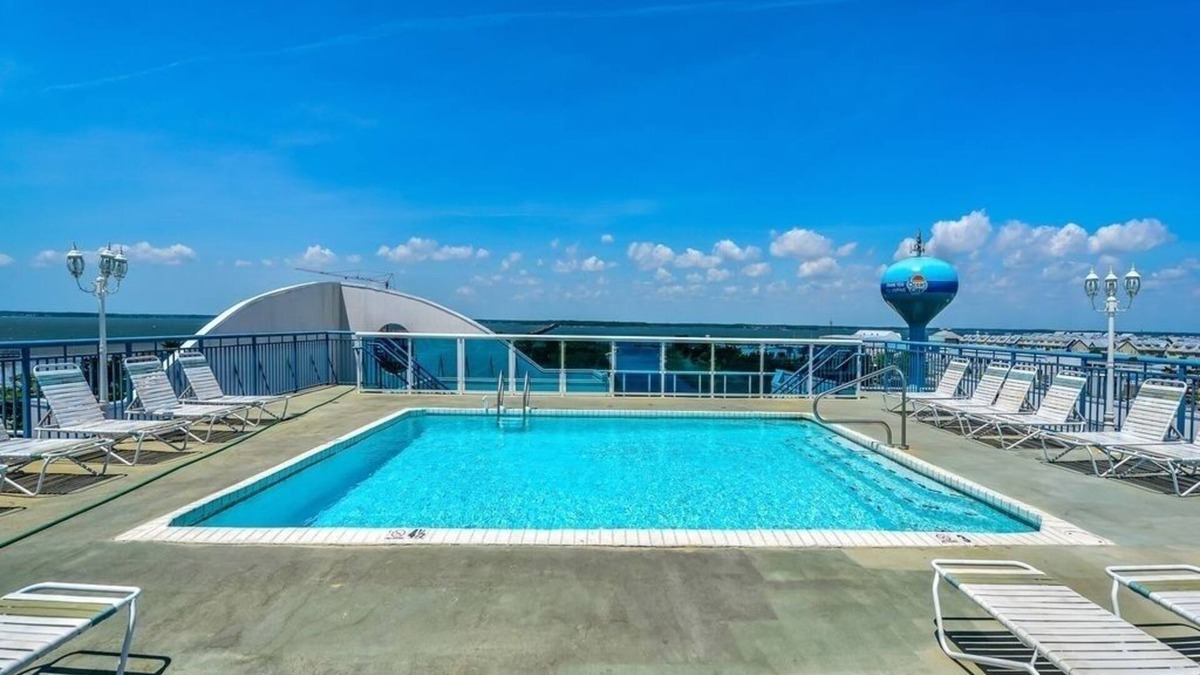 Midtown Ocean City Condo | STUNNING and BAY FRONT - Mid Town -Sleeps 7 in beds w/pool. Walk to the beach!