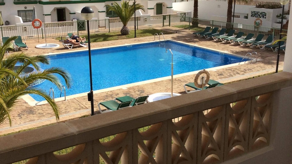 Caleta de Fuste Apartment | STUNNING ART DECO 'GAUDIA' COMPLEX REFURBISHED POOLSIDE DUPLEX APARTMENT