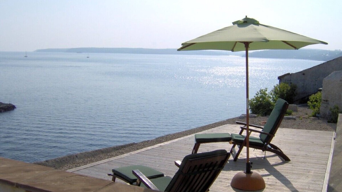 Whitegate Cottage | Stunning Lighthouse Cottage with spectacular views