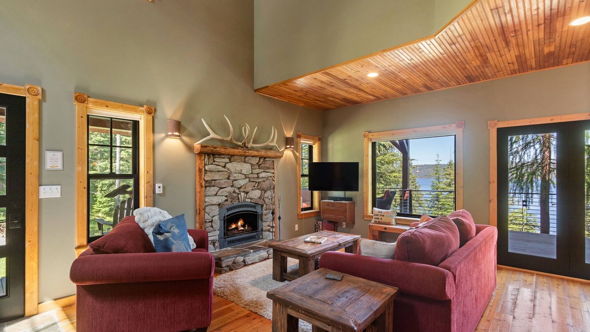 Coeur d'Alene House | Stunning mountain escape with lake views, expansive furnished deck & firepit - dog-friendly