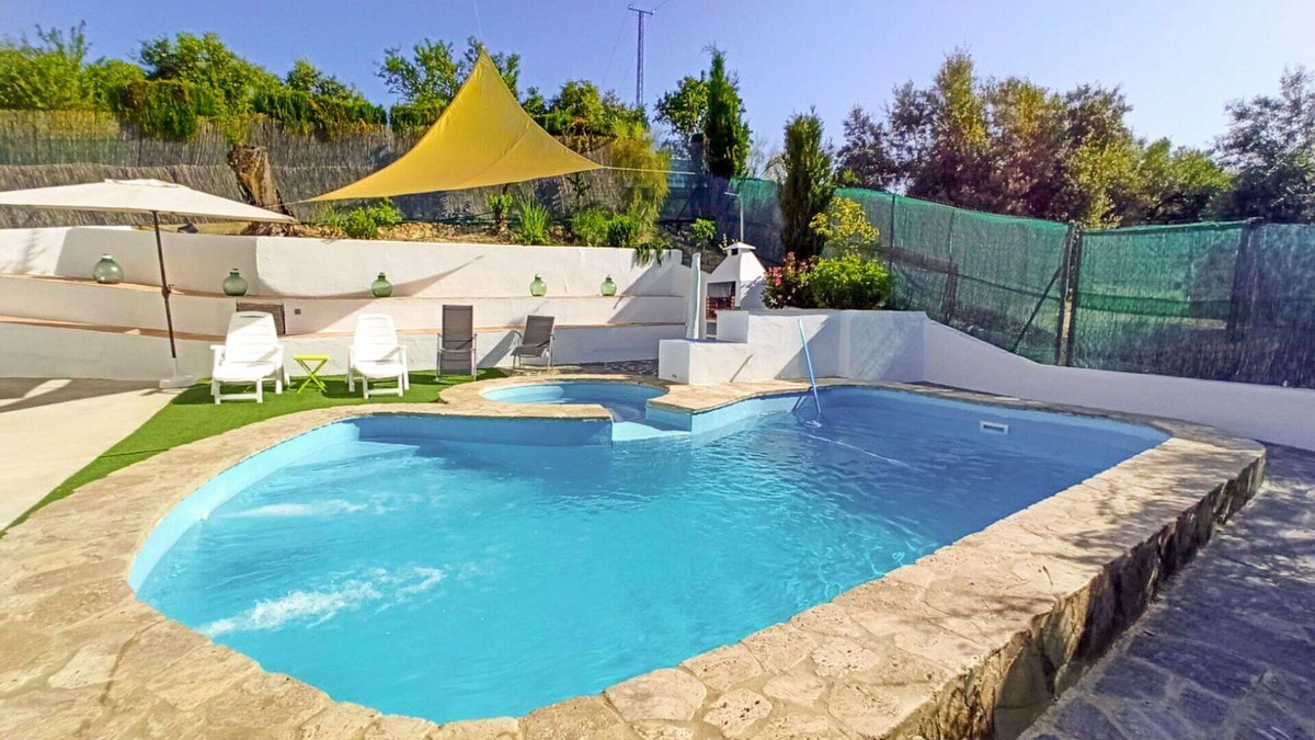 Cabra Villa | Stunning private villa with A/C, private pool, WIFI, hot tub, TV, terrace and pets allowed