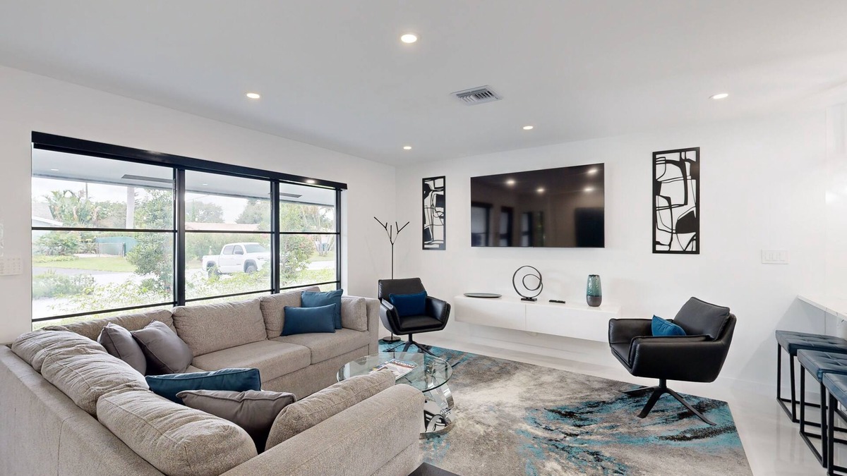 Coral Ridge Isles House | Stunning single level home with, heated pool, kitchen, & fully equipped BBQ area