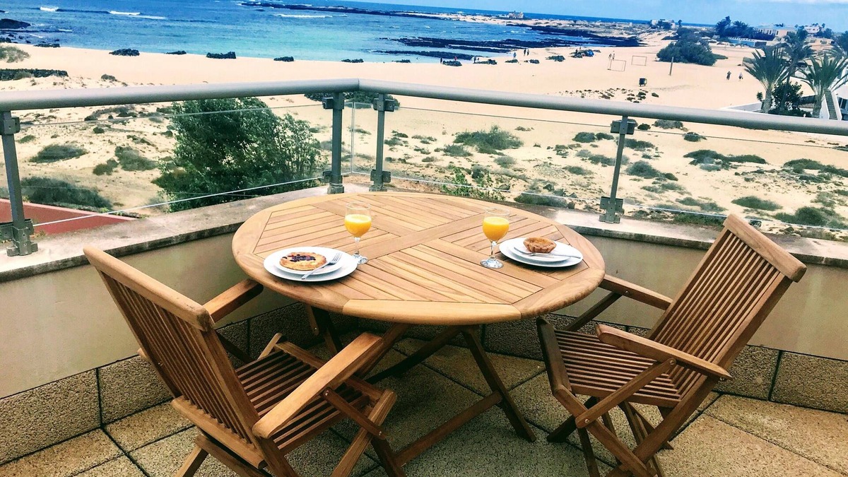 Los Lagos Apartment | Stunning views & location. Spacious 1 bed apartment directly on beach El Cotillo