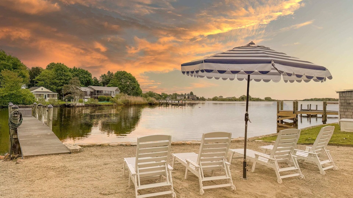 Kenyon Cottage | Stunning waterfront home with big yard & dock! Voted #1 rental in all of RI!