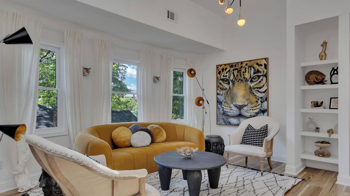 Inman Park Apartment | Stylish 3BR/3BA upper unit in fully remodeled 1920s duplex. Vaulted ceilings, updated kitchen, smart TVs, and private balcony. Perfect for families or groups in walkable Inman Park near BeltLine, dining, and MARTA.