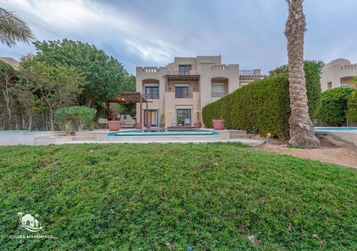 Shurtah al-Dakhlah Villa | Stylish 4-Bedroom Villa with a Pool & Lagoon Access