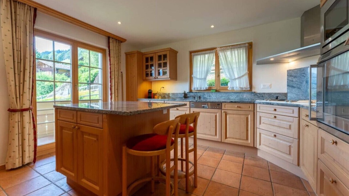 Rougemont Apartment | Stylish Alps apartment near Rougemont Village with mountain views.