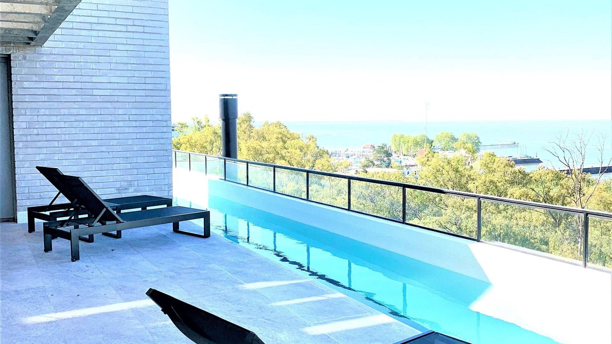 Olivos Apartment | Stylish apartment by river with pool & grill
