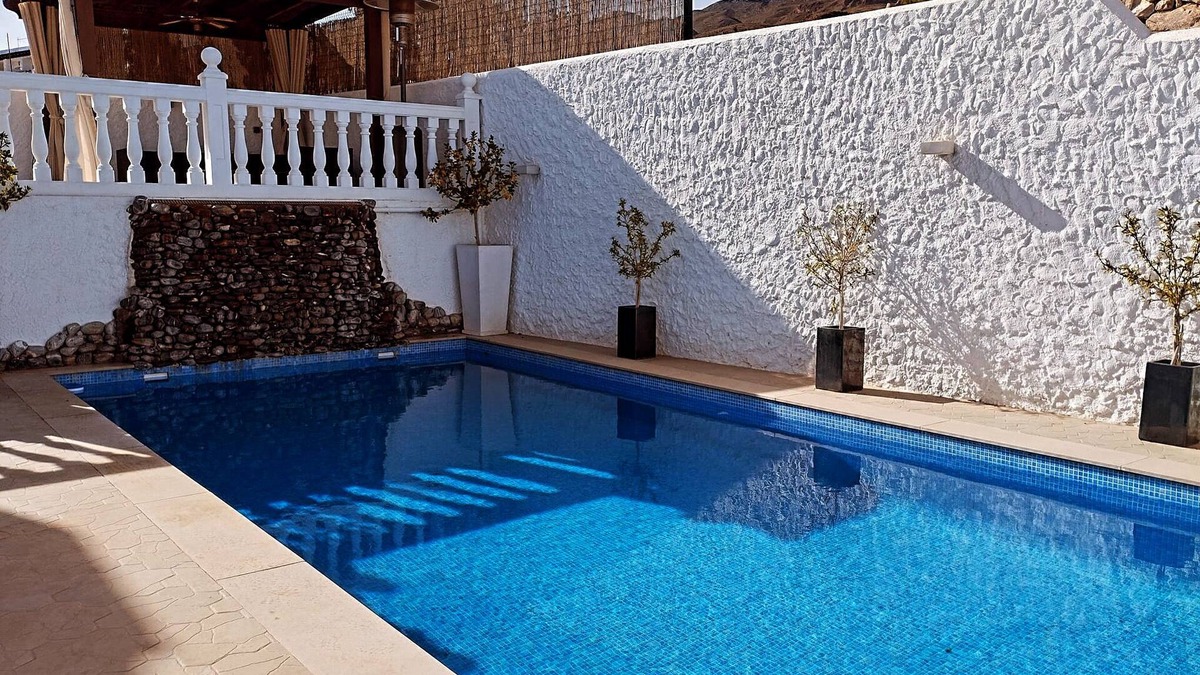 La Parata Villa | Stylish villa with heated pool. 7 minute walk to beach, bars and restaurants!