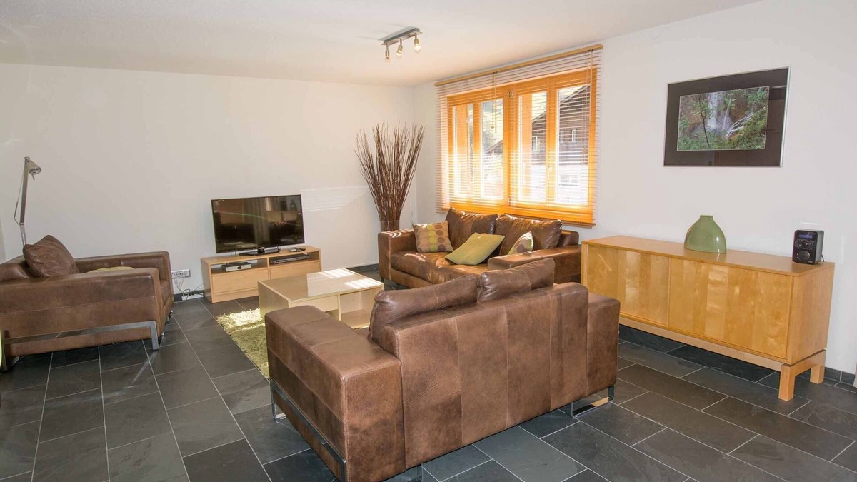 Adelboden Apartment | Stylishly furnished vacation apartment near the mountain railroads.