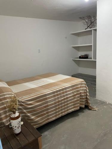 Areia House | Suíte Aconchego