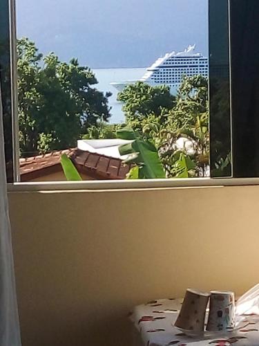 Veloso House | Suíte Ninho do Sabiá