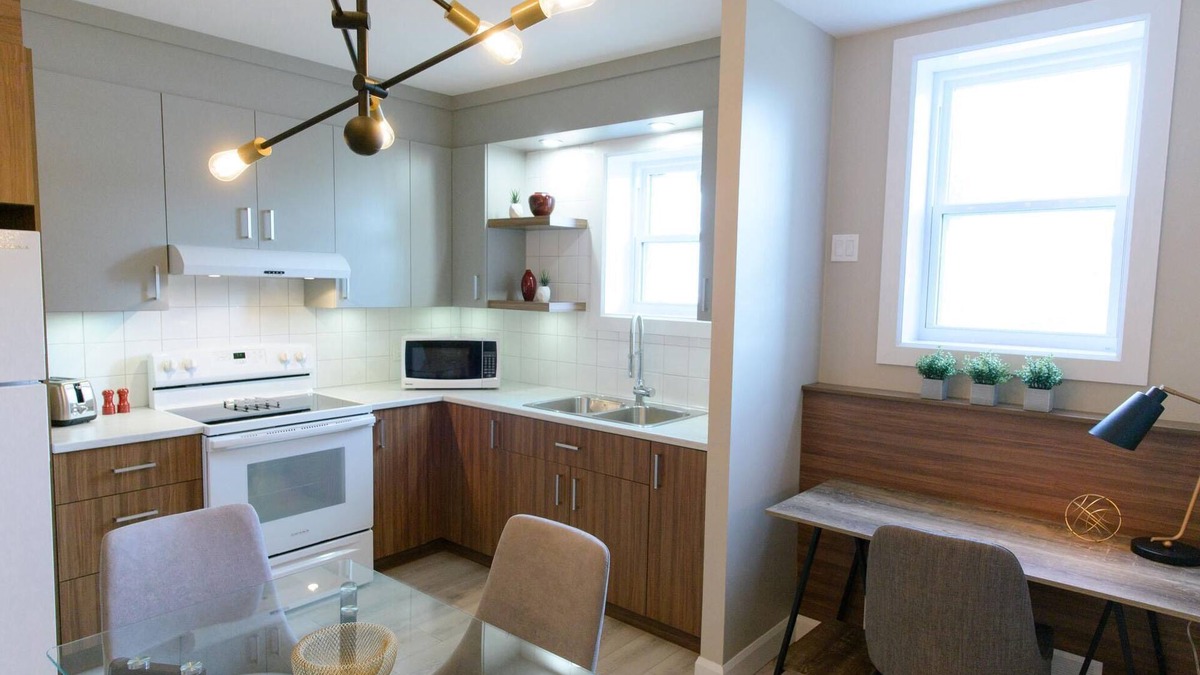 Rouyn-Noranda Apartment | Suite with cloesed bedroom and sofa bed in the city center (Le Court-toit)