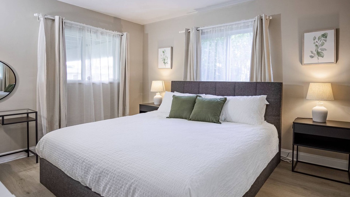 Central Business District House | Sunny & Heated Pool Vacation Home, Beach Proximity, Cozy Beds & Wi-Fi