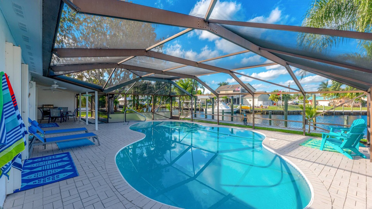 Palm City House | Sunset Landing amazing waterfront Views.