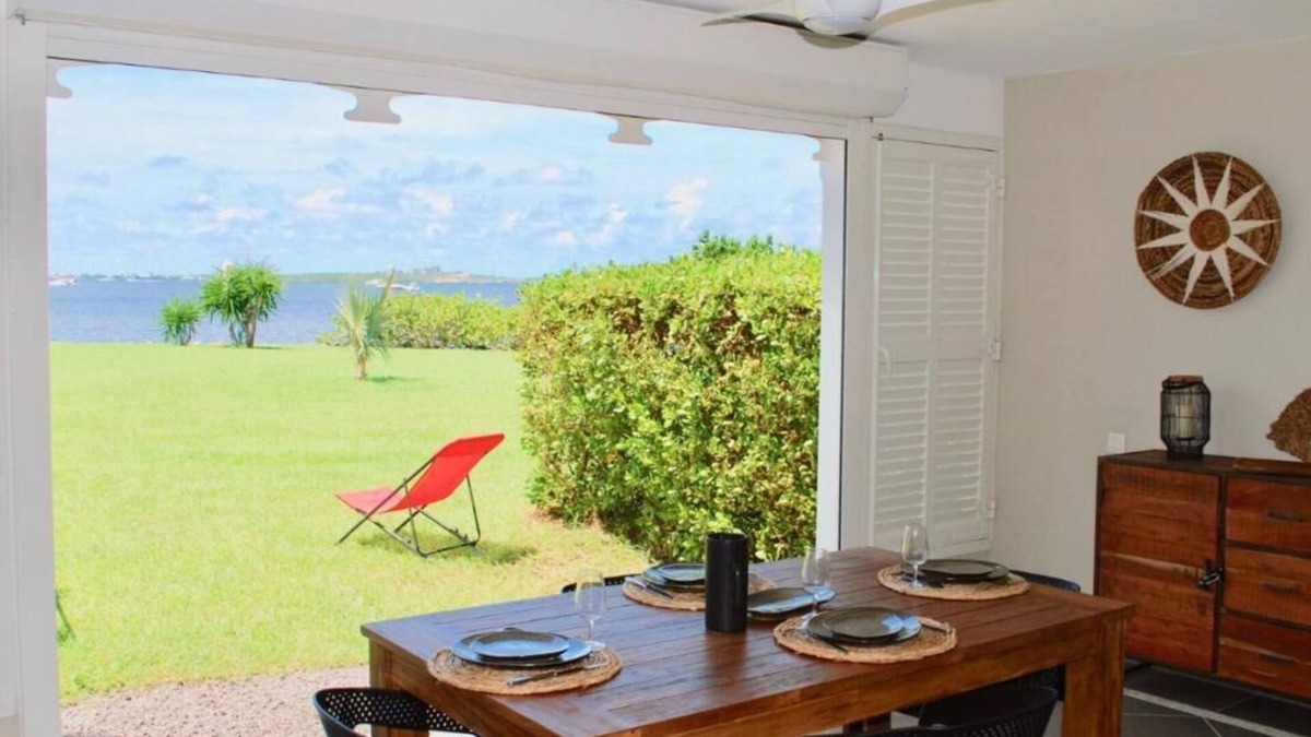 Marigot Apartment | Sunset on lagoon from the terrace